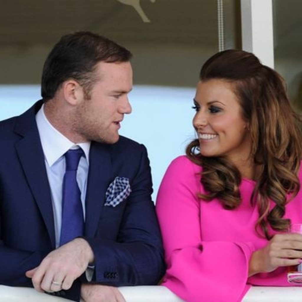 Rooney's wife hits back at England boo-boys as he's axed for Slovenia clash