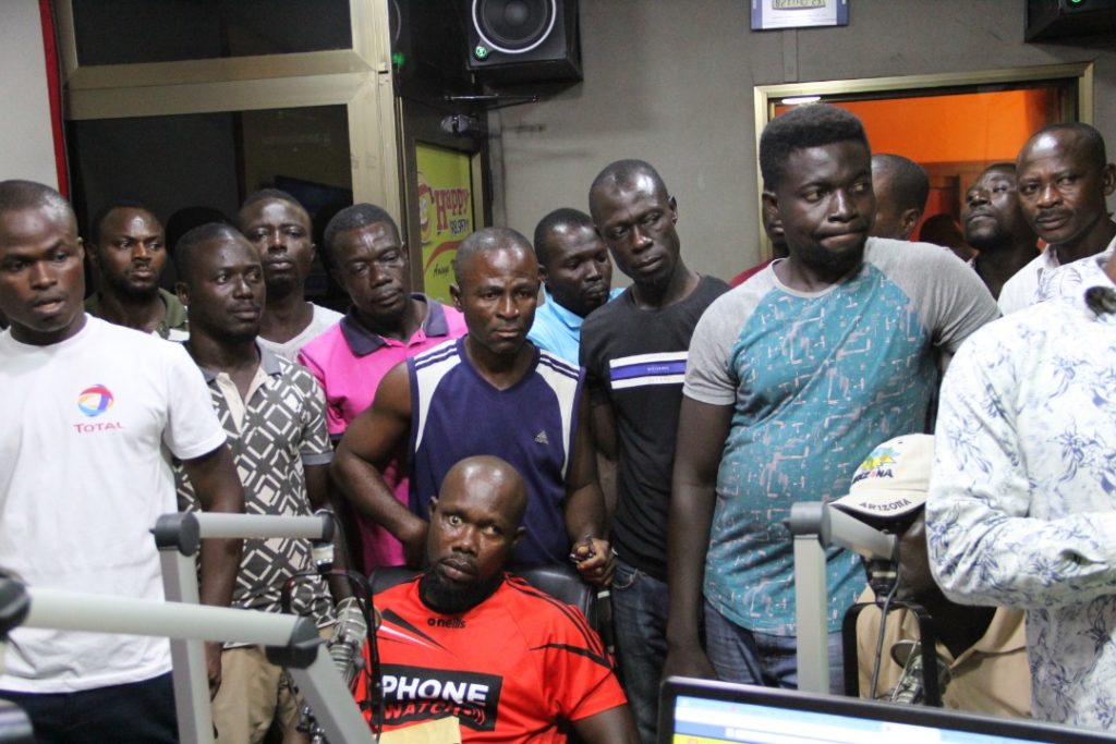 Photos + Video: Taxi Drivers storm premises of Happy FM over alleged assault on colleague by city guard