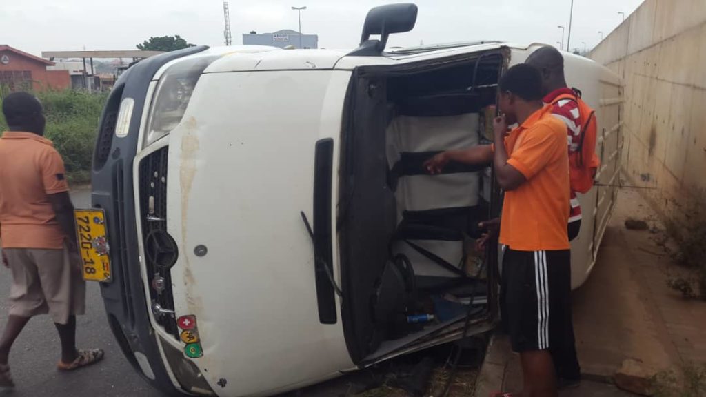 Photos: Driver escapes death, as bus somersaults on Awoshie-Ablekuma road