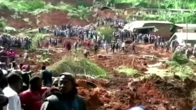 Dozens trapped underground after deadly landslide