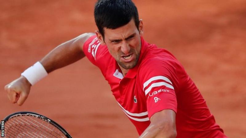 Djokovic fights back to win French Open