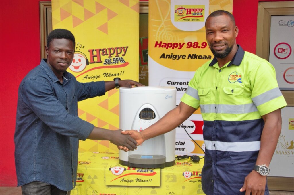 Tovila Water Solutions presents product worth Ghc5k to Happy FM’s Super Clash predict and win promo winner