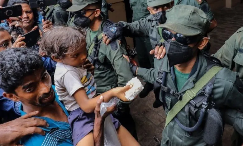 Sri Lanka swears in acting leader after mass protests