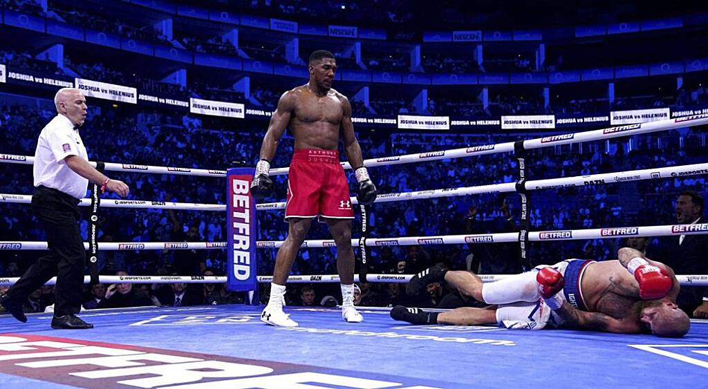 Joshua knocks out Helenius in seventh round