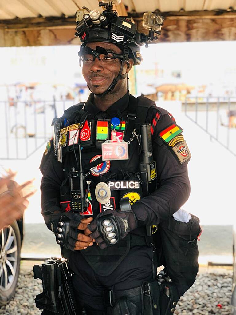 Meet Ghana’s ‘Commando’ the Police Officer with the most camera gears planted on him