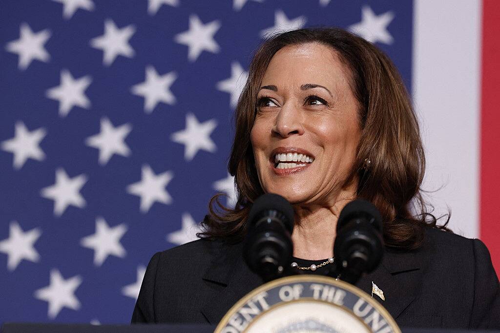 Backed by Biden, Harris moves to lock up White House bid